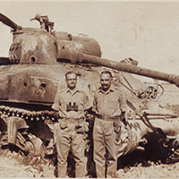 Major Shiv Mehdiratta and Brig. Hari Singh with a destroyed Sherman Tank of Pakistani Army.
