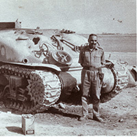 Brig. Hari Singh in front of a destroyed Sherman Tank of Pakistani Army